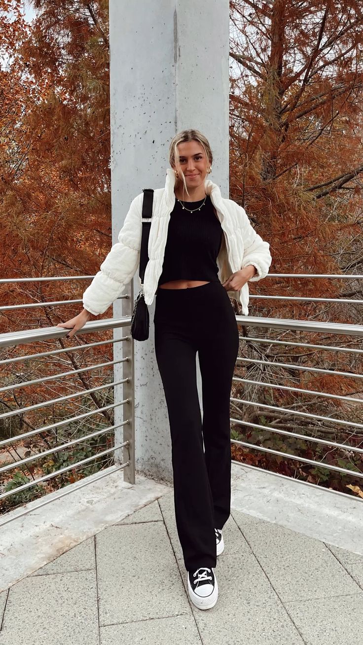 White Puffer Jacket with Black Flare Leggings 